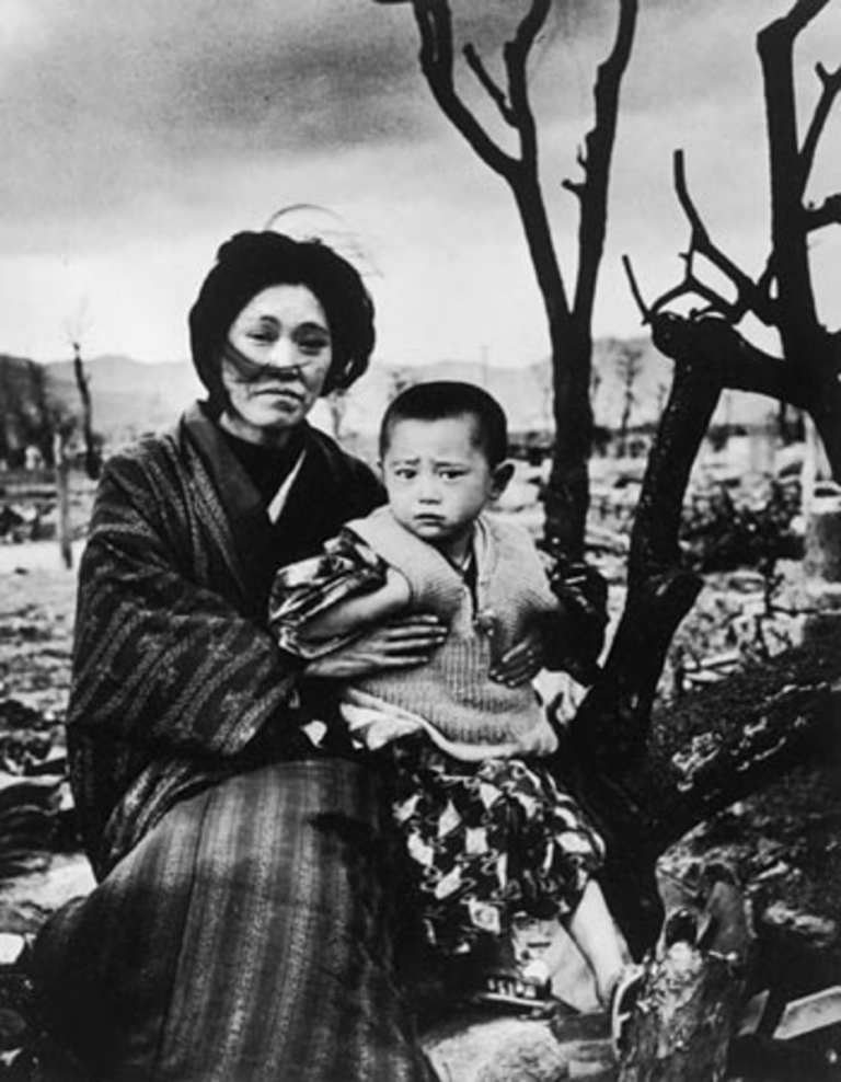 A woman and a baby in the devastated city of Hiroshima